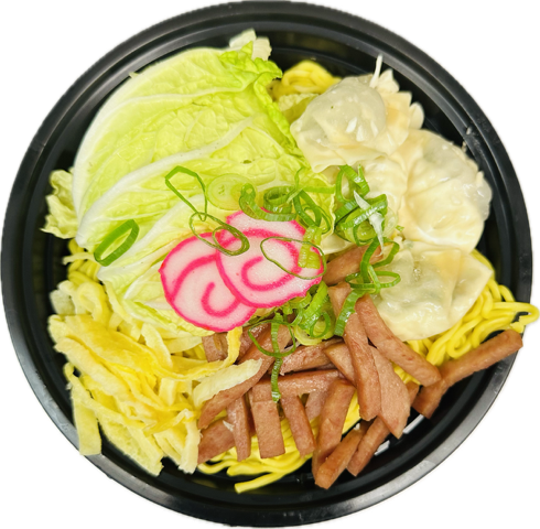 Won Ton Min bowl from above with ramen, grilled spam, shredded egg, won ton, won bok, kamaboko, and green onion
